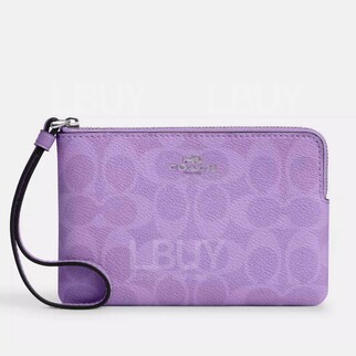 Coach Corner Zip Wristlet In Signature Canvas